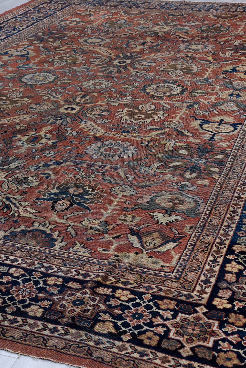 12' x 18' one-of-a-kind handmade antique Sultanabad oversize rug. Color palette: terra cotta, navy, ivory, slate, rust