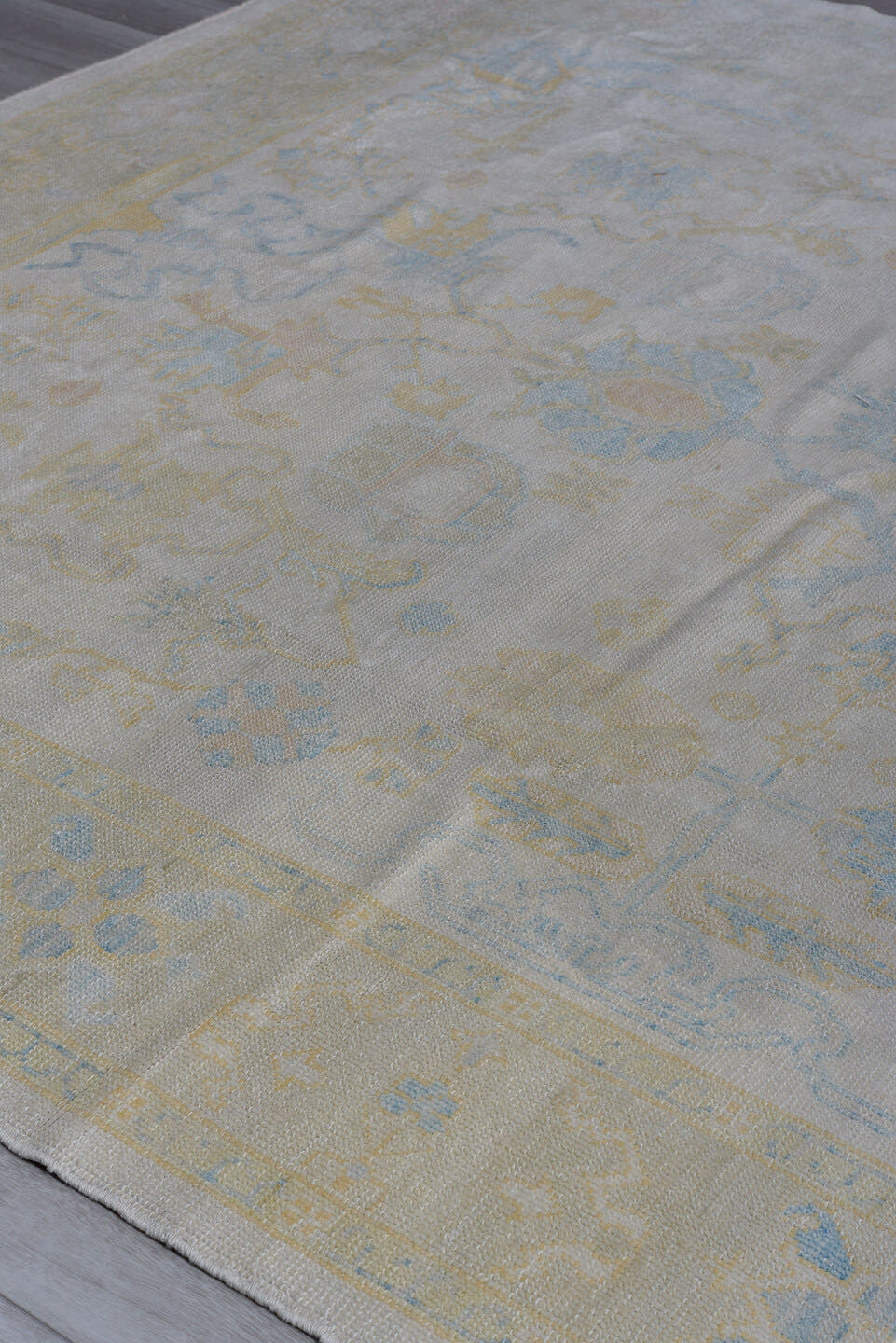8' x 10' one-of-a-kind handmade vintage Oushak large size rug. Color palette: ivory, pale blue, gold, cream, beige
