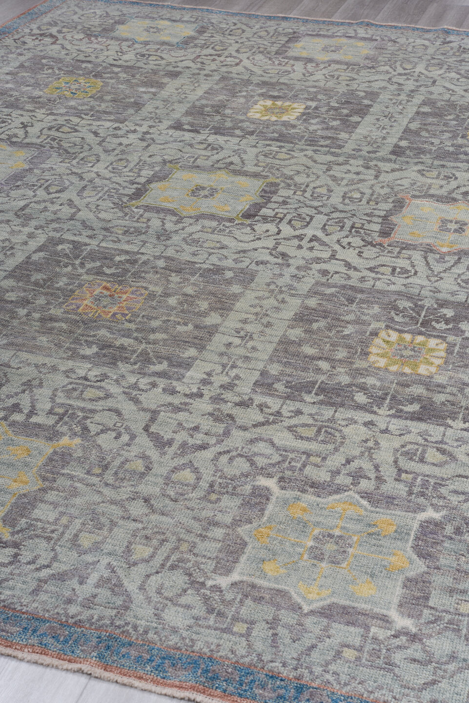 8' x 12' one-of-a-kind handmade vintage Oushak large size rug. Color palette: gray, pale blue, ivory, gold, taupe, rust