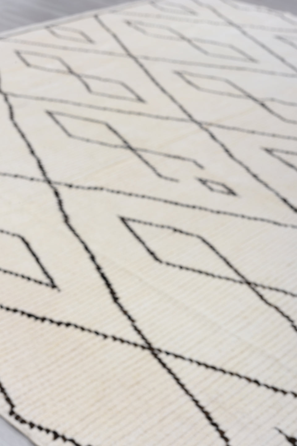 9' x 13' one-of-a-kind handmade vintage Tulu large size rug. Color palette: black, brown, gray, light gray, linen, off-white