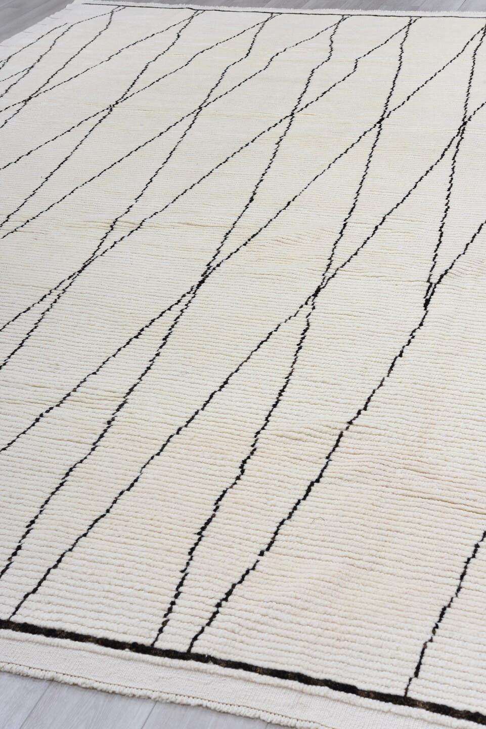 9' x 13' one-of-a-kind handmade vintage Tulu large size rug. Color palette: ivory, charcoal, gray, black