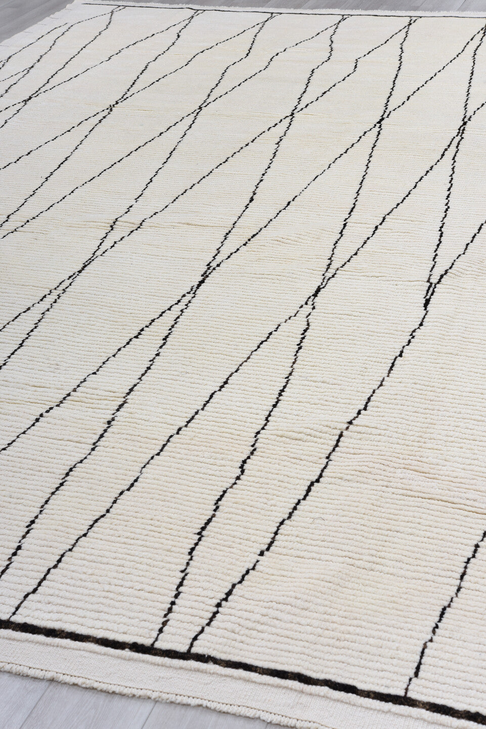 9' x 13' one-of-a-kind handmade vintage Tulu large size rug. Color palette: ivory, charcoal, gray, black