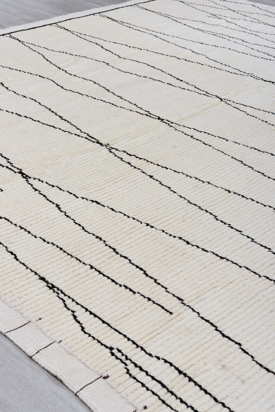 9' x 13' one-of-a-kind handmade vintage Tulu large size rug. Color palette: ivory, charcoal, gray, black