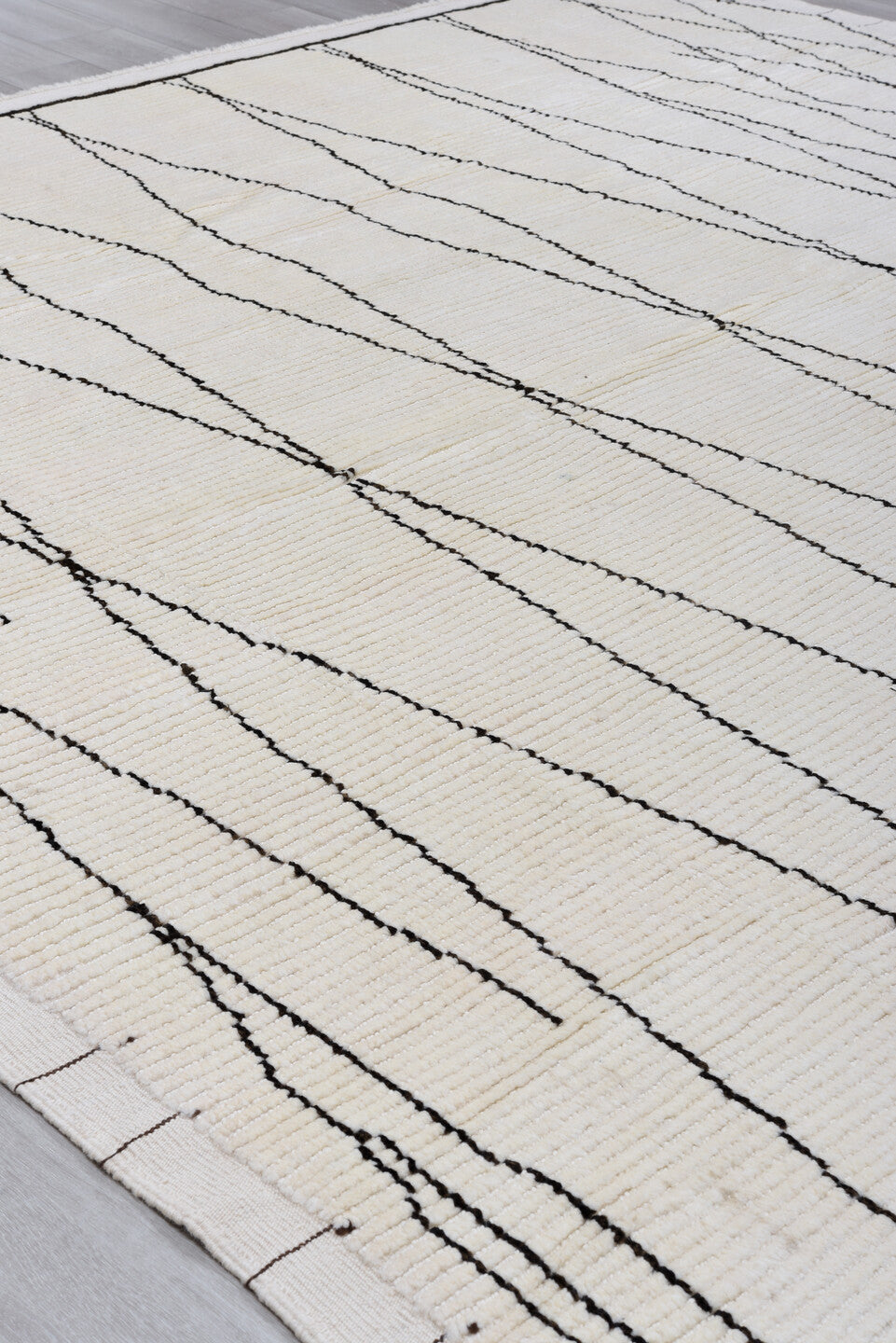 9' x 13' one-of-a-kind handmade vintage Tulu large size rug. Color palette: ivory, charcoal, gray, black