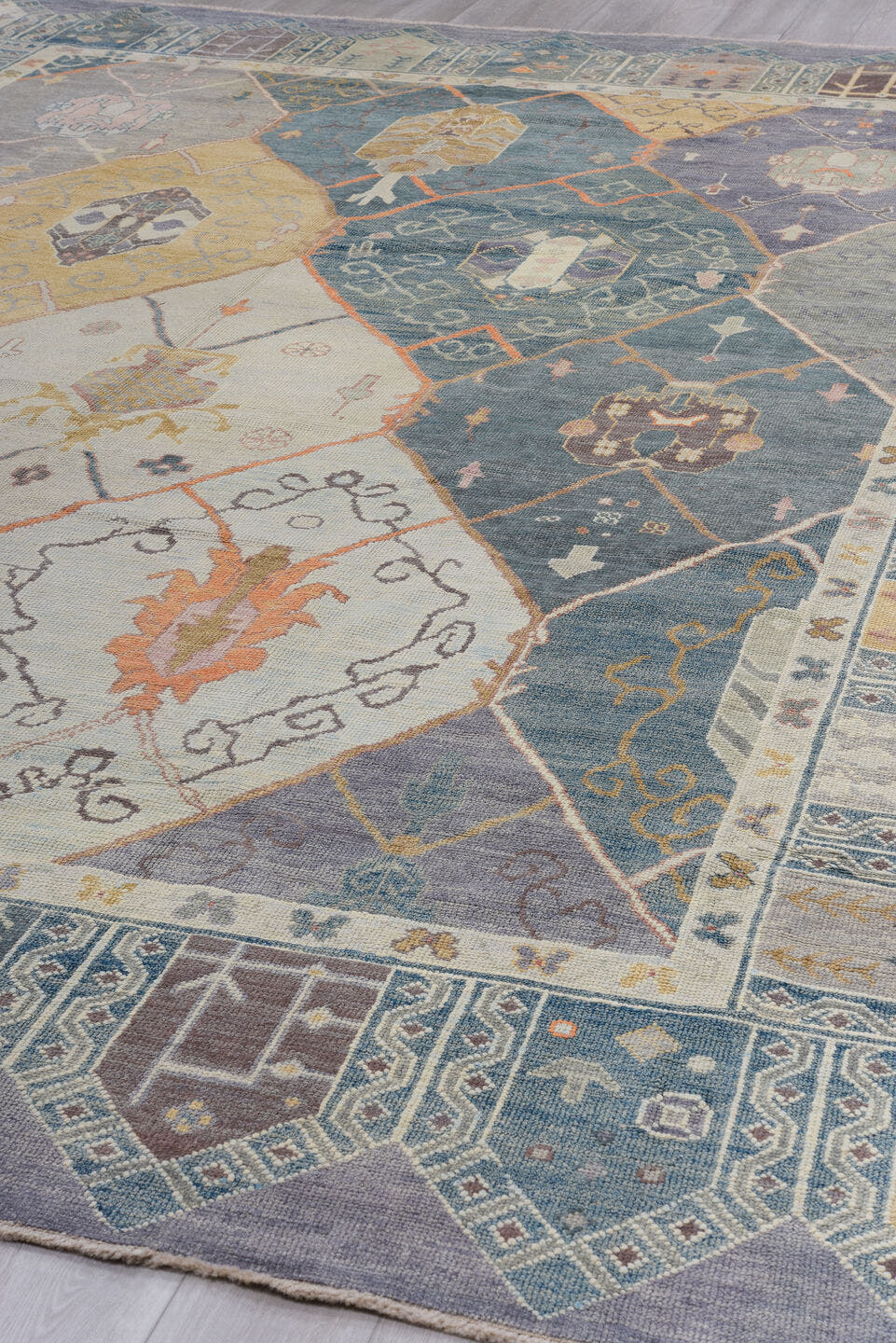 11' x 15' one-of-a-kind handmade vintage Oushak oversize rug. Color palette: blue, ivory, slate, gold, taupe, terra cotta