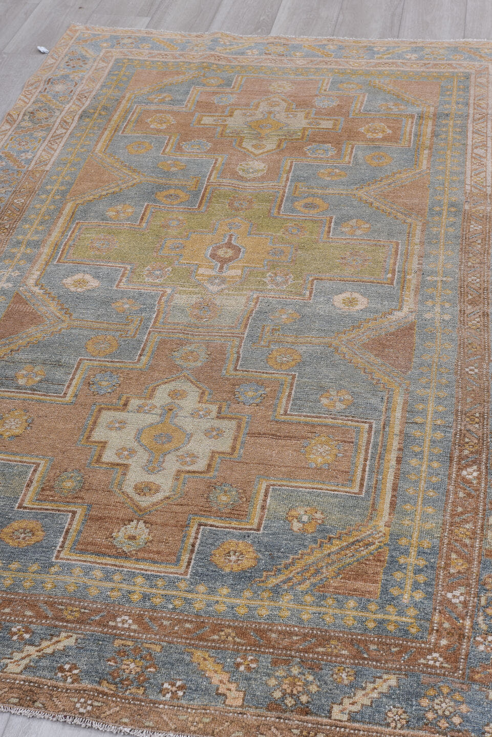 4' x 7' one-of-a-kind handmade antique Malayer rug. Color palette: blue, camel, ivory, taupe, tan, sage, brown, beige, gray