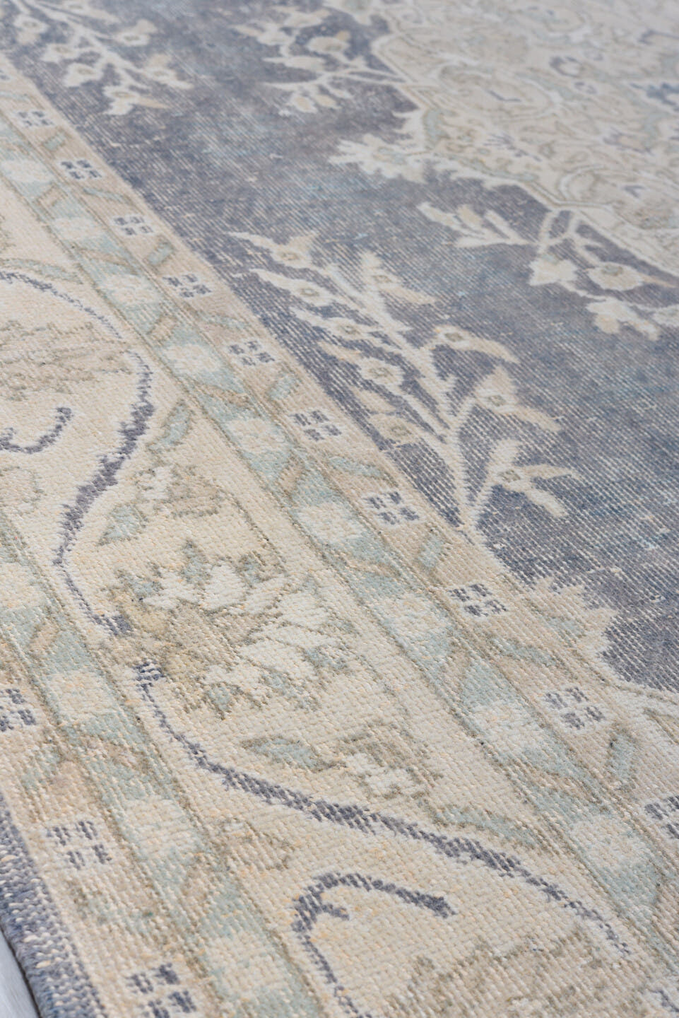 7' x 11' one-of-a-kind handmade antique Sparta large size rug. Color palette: ivory, slate, taupe, sage, beige, pale blue