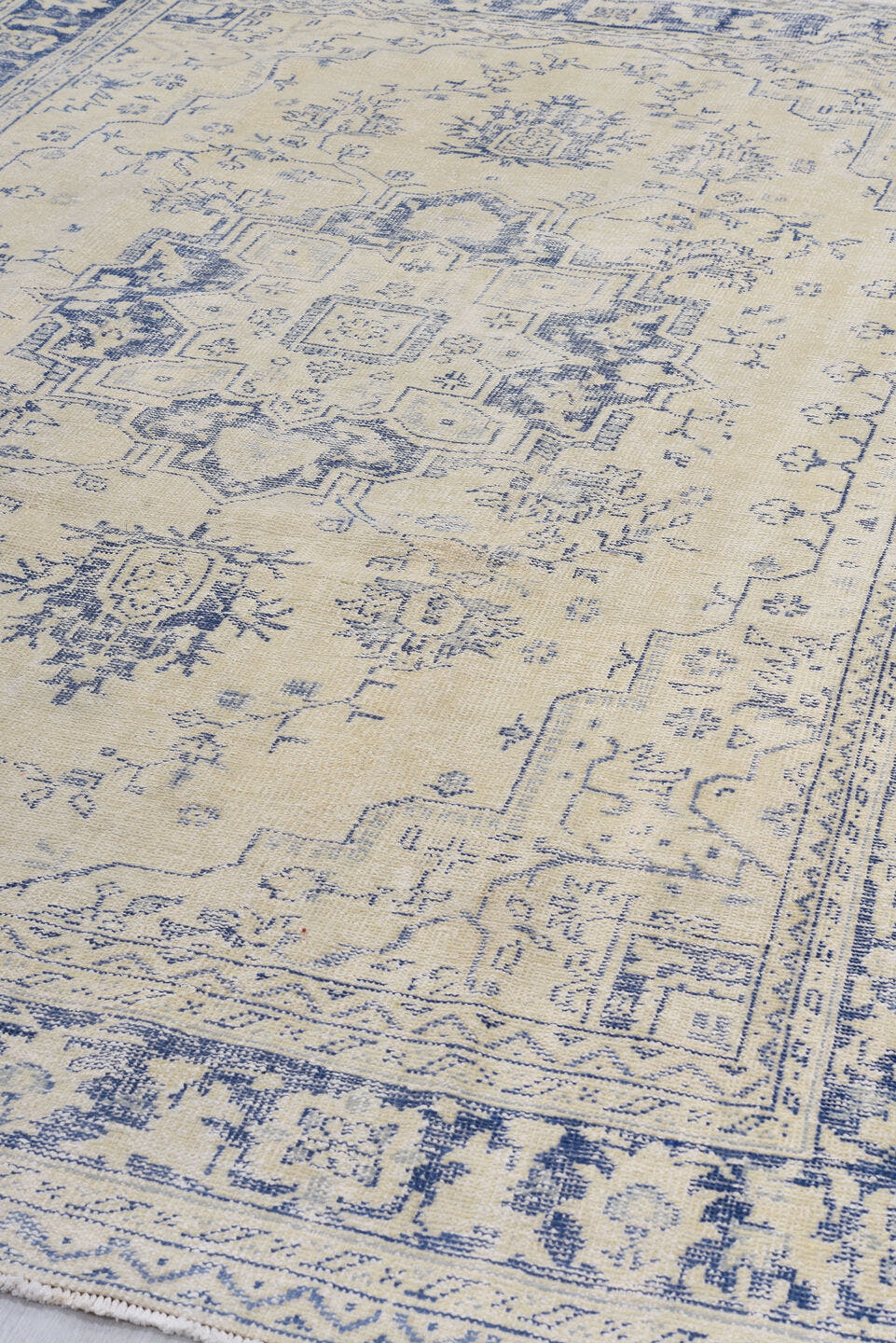 7' x 10' one-of-a-kind handmade antique Sparta large size rug. Color palette: ivory, powder blue, slate, cream, light blue