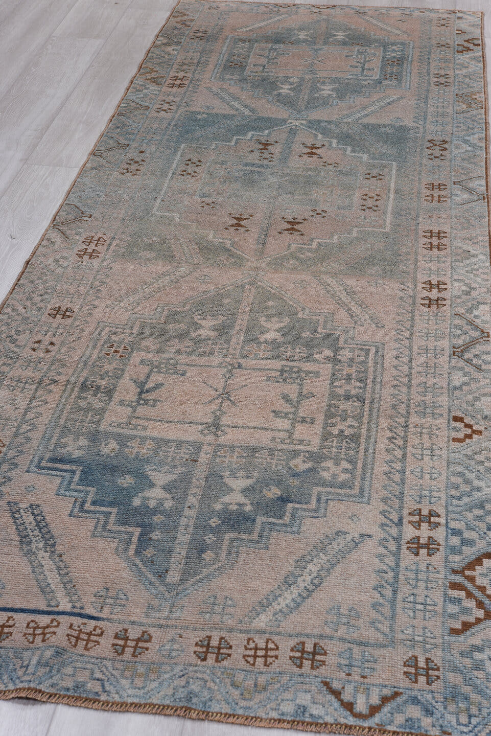 3' x 10' one-of-a-kind handmade antique Oushak runner rug. Color palette: sky blue, blush, ivory, rust, taupe, slate