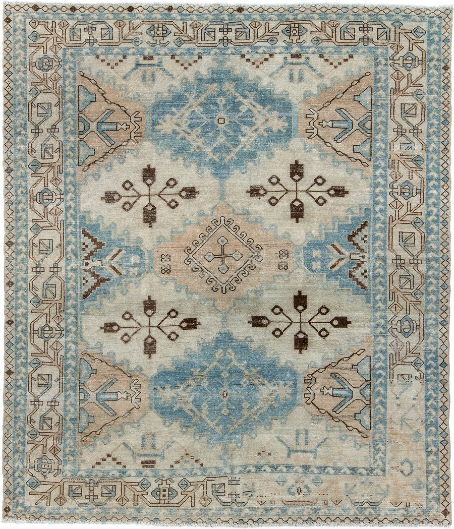 5' x 6' one-of-a-kind handmade antique Baktiary rug. Color palette: ivory, sky blue, camel, brown, taupe, light blue, beige