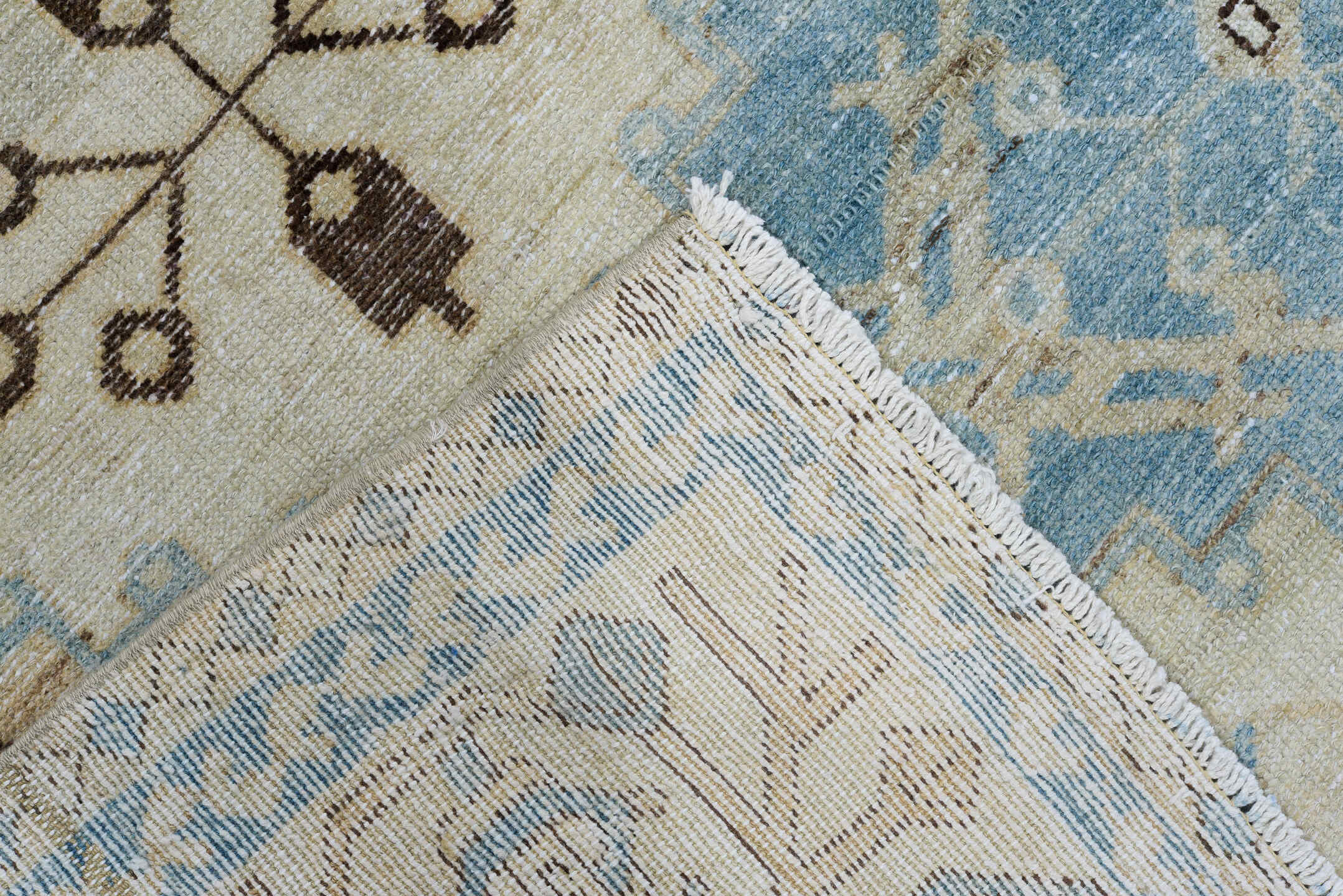 5' x 6' one-of-a-kind handmade antique Baktiary rug. Color palette: ivory, sky blue, camel, brown, taupe, light blue, beige