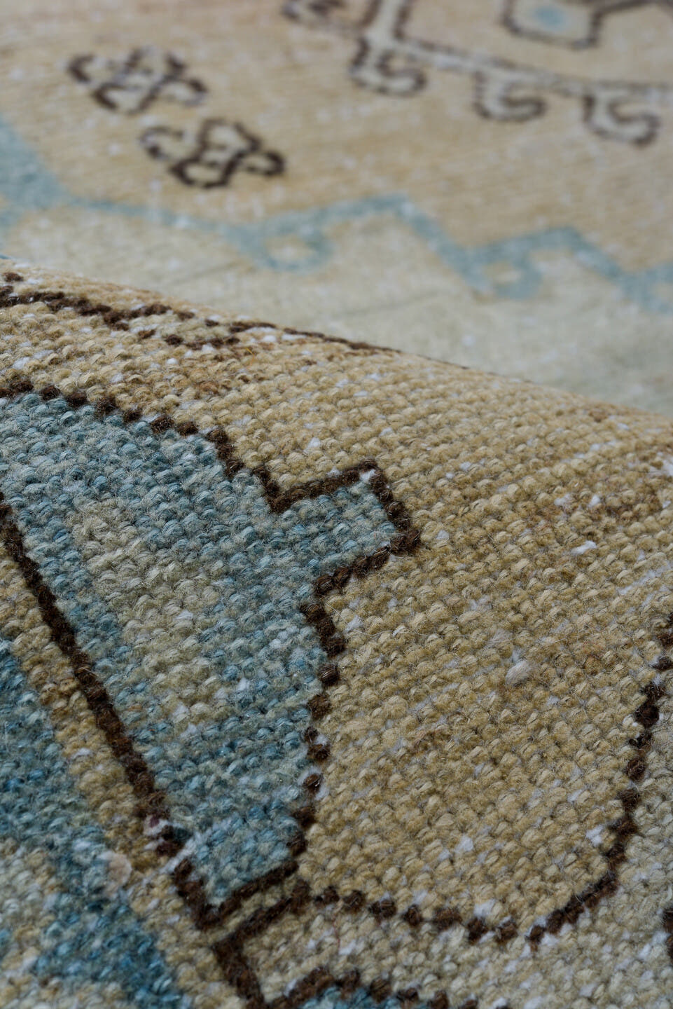 5' x 6' one-of-a-kind handmade antique Baktiary rug. Color palette: ivory, sky blue, camel, brown, taupe, light blue, beige