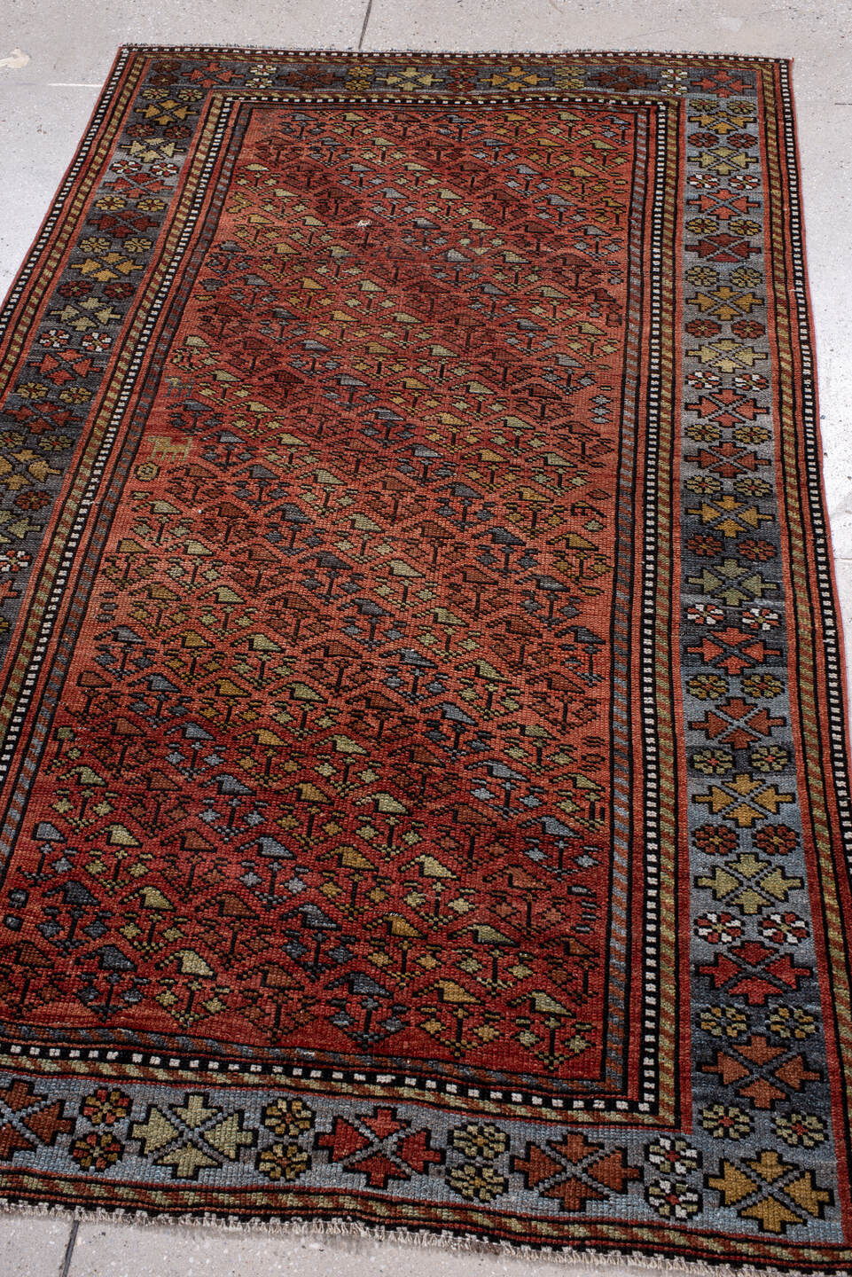 3' x 6' one-of-a-kind handmade antique Kurd small size rug. Color palette: rust, slate, burgundy, ivory, gold, charcoal