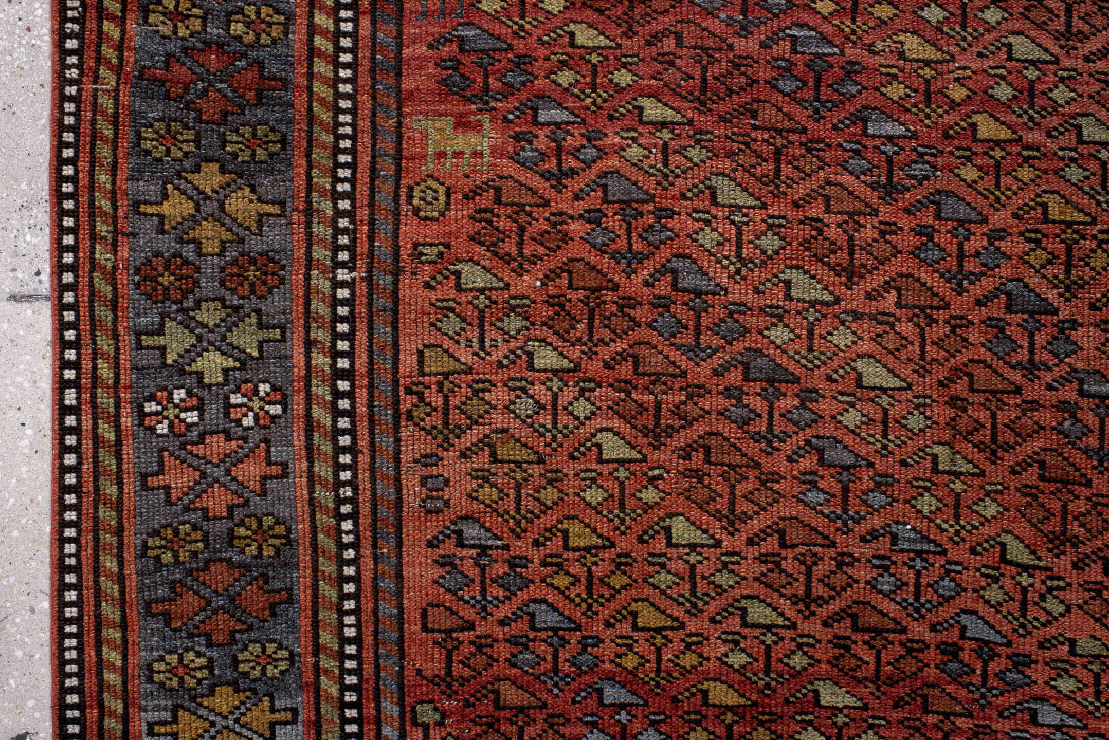 3' x 6' one-of-a-kind handmade antique Kurd small size rug. Color palette: rust, slate, burgundy, ivory, gold, charcoal