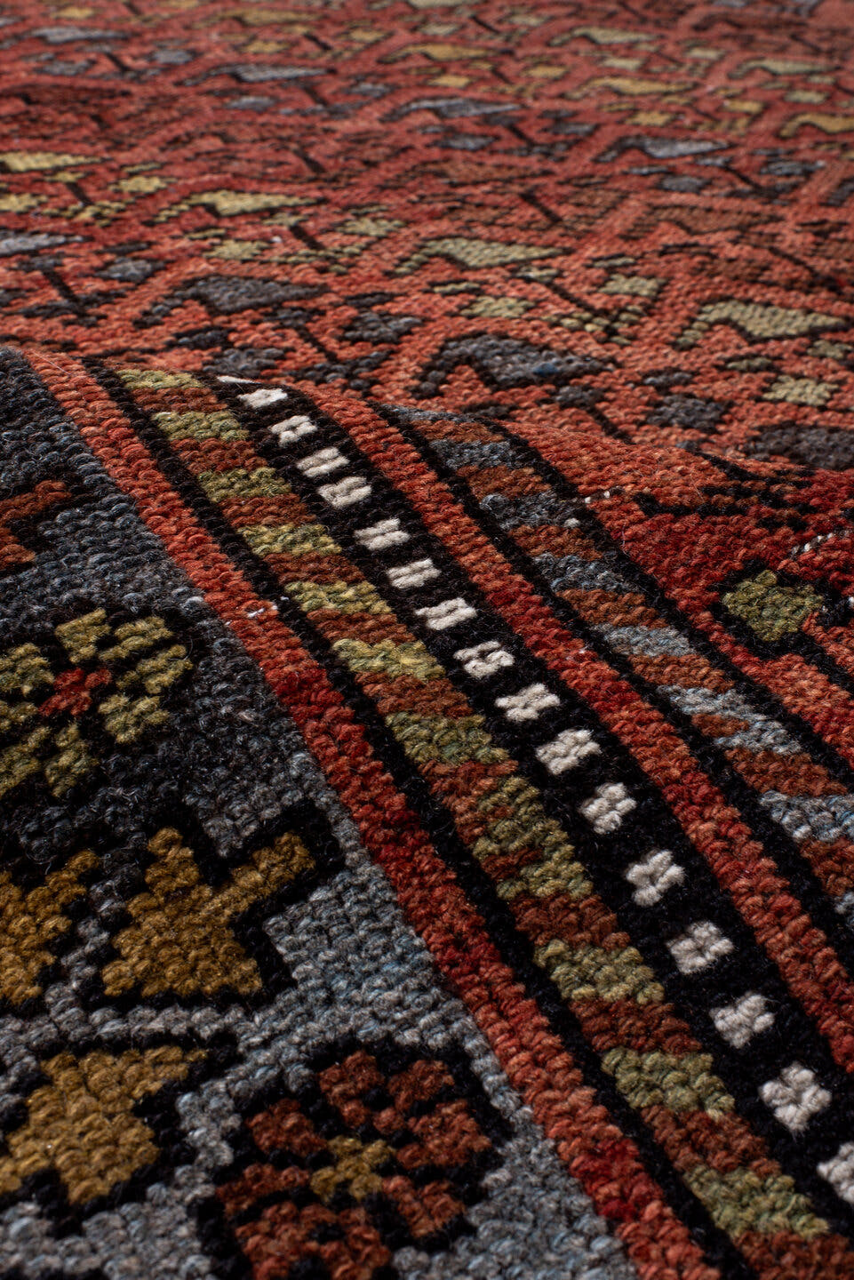 3' x 6' one-of-a-kind handmade antique Kurd small size rug. Color palette: rust, slate, burgundy, ivory, gold, charcoal
