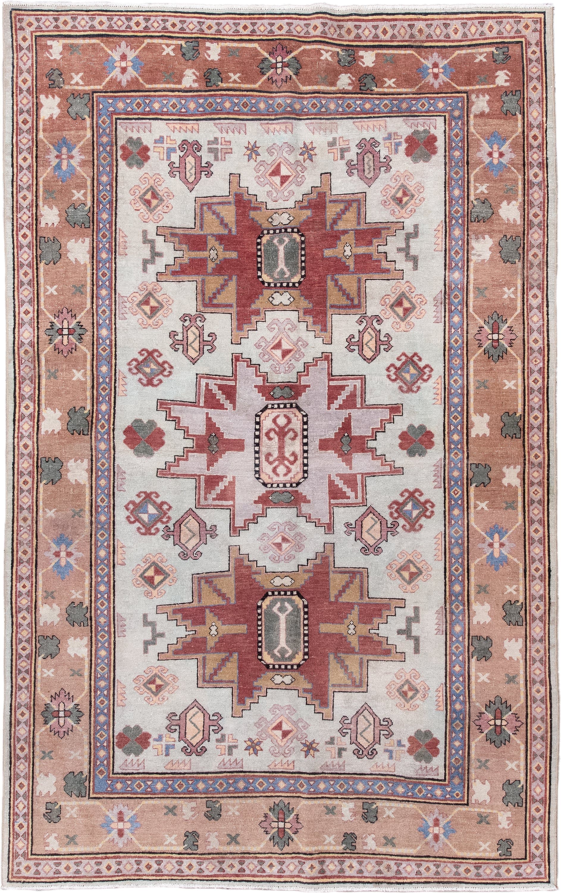 4' x 7' one-of-a-kind handmade antique Khotan rug. Color palette: ivory, camel, rose, dusty blue, sage, rust, taupe, beige