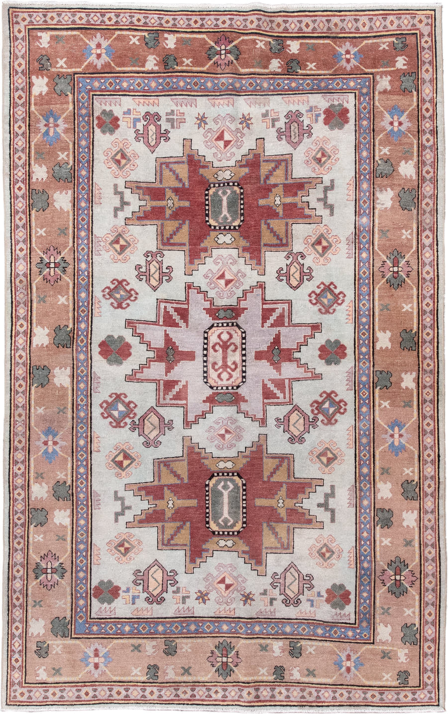 4' x 7' one-of-a-kind handmade antique Khotan rug. Color palette: ivory, camel, rose, dusty blue, sage, rust, taupe, beige