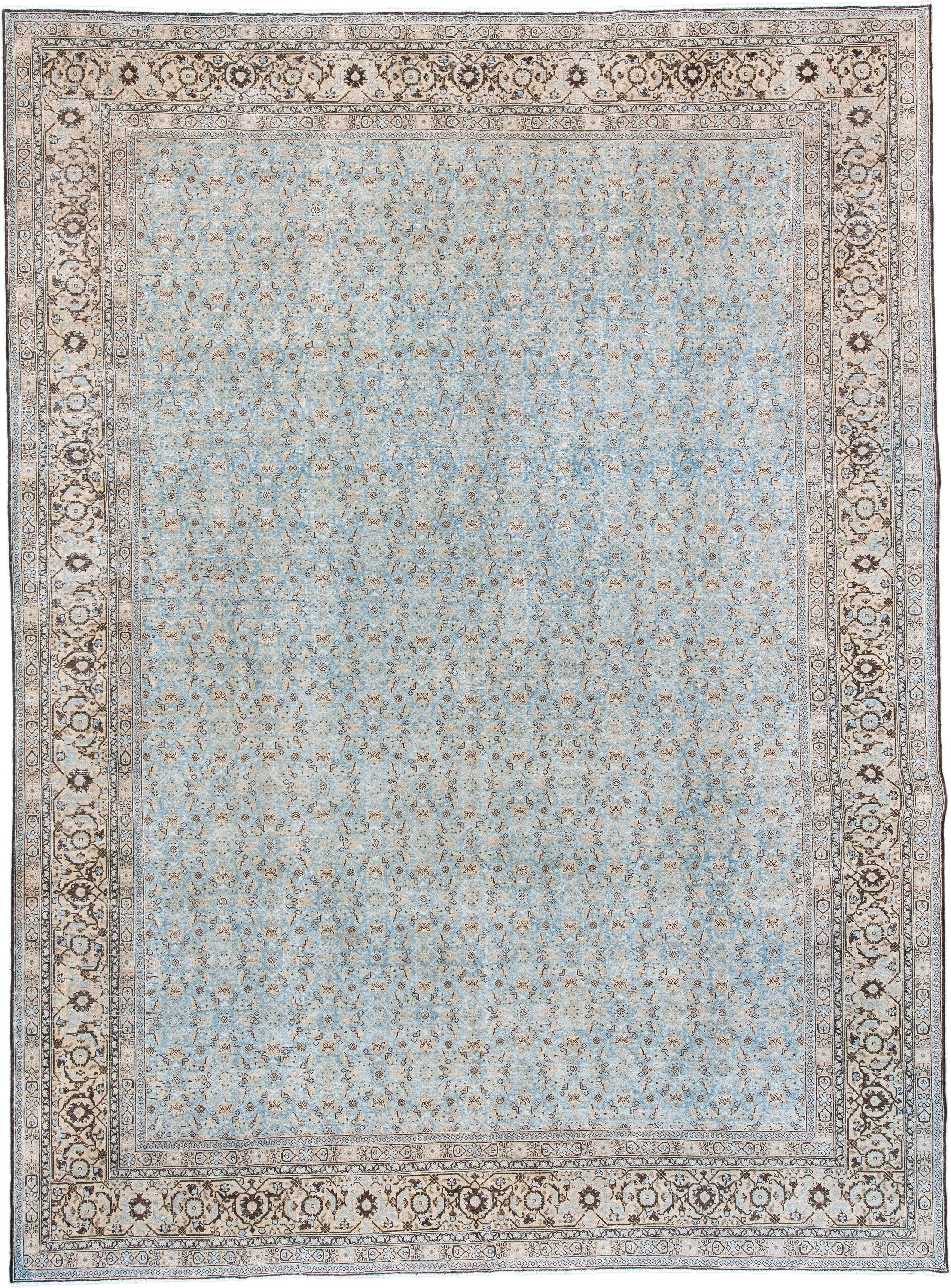 10' x 14' one-of-a-kind handmade antique Tabriz large size rug. Color palette: light blue, ivory, taupe, brown, beige, camel