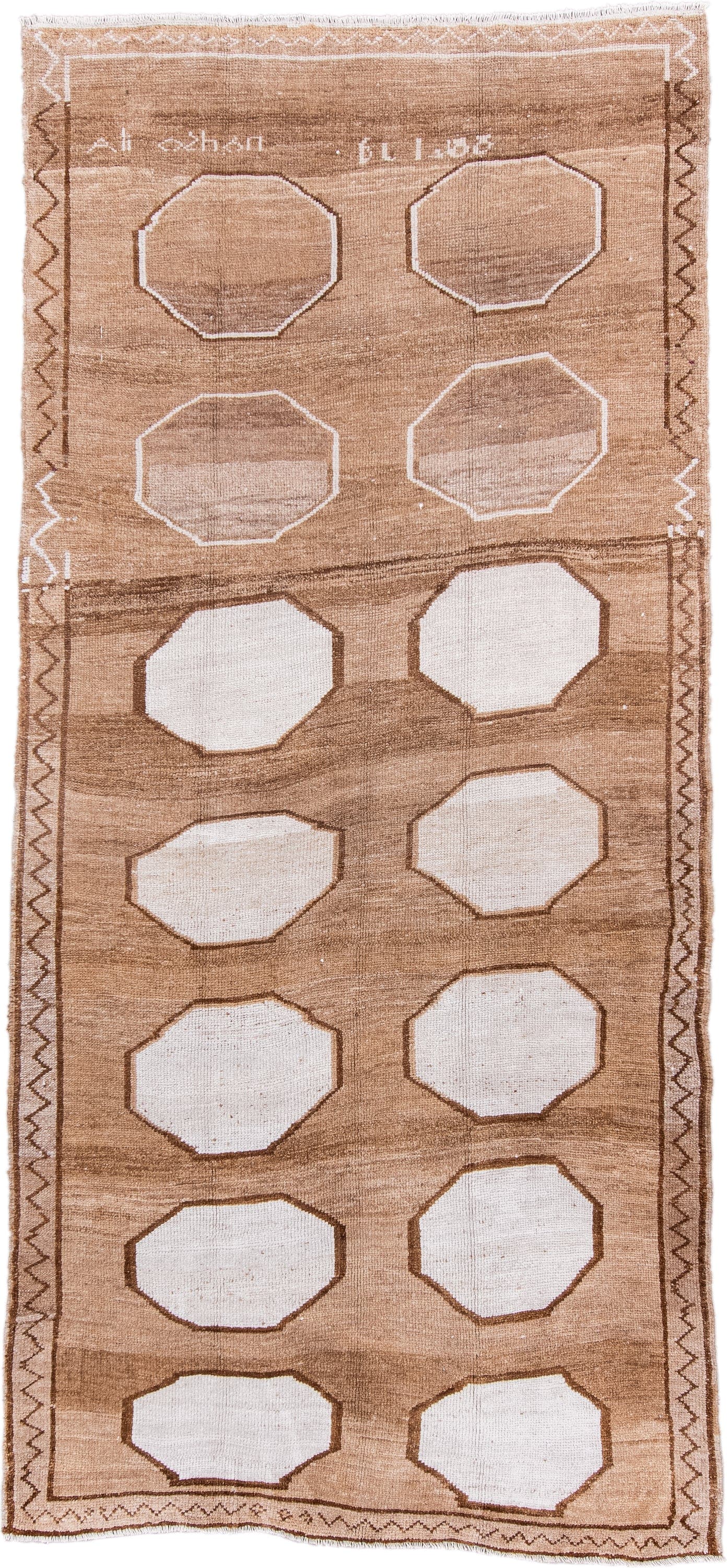 5' x 11' one-of-a-kind handmade antique Kars rug. Color palette: camel, ivory, taupe, brown, beige, gray