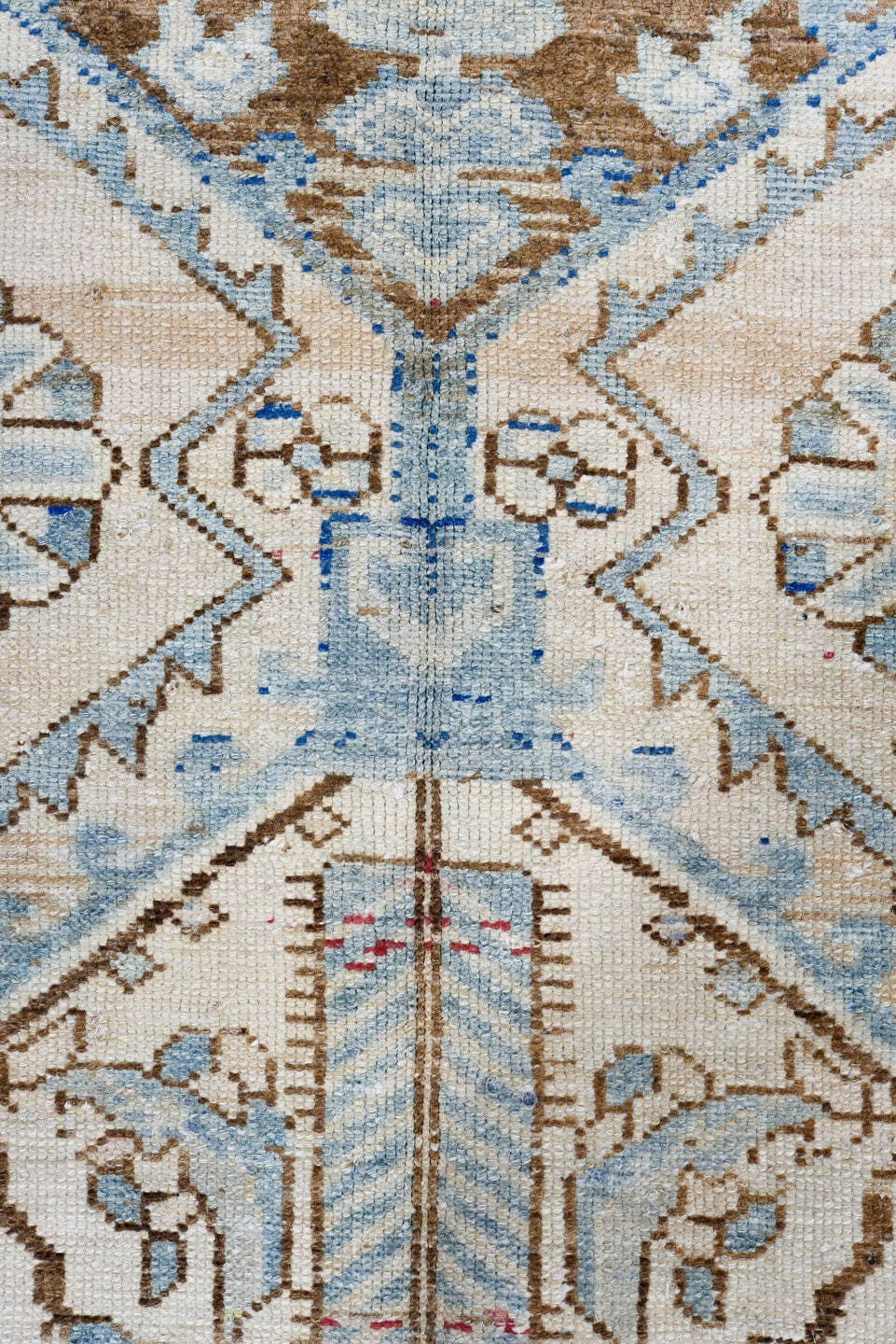 5' x 9' one-of-a-kind handmade antique Baktiary medium size rug. Color palette: ivory, sky blue, camel, brown, rose, crimson