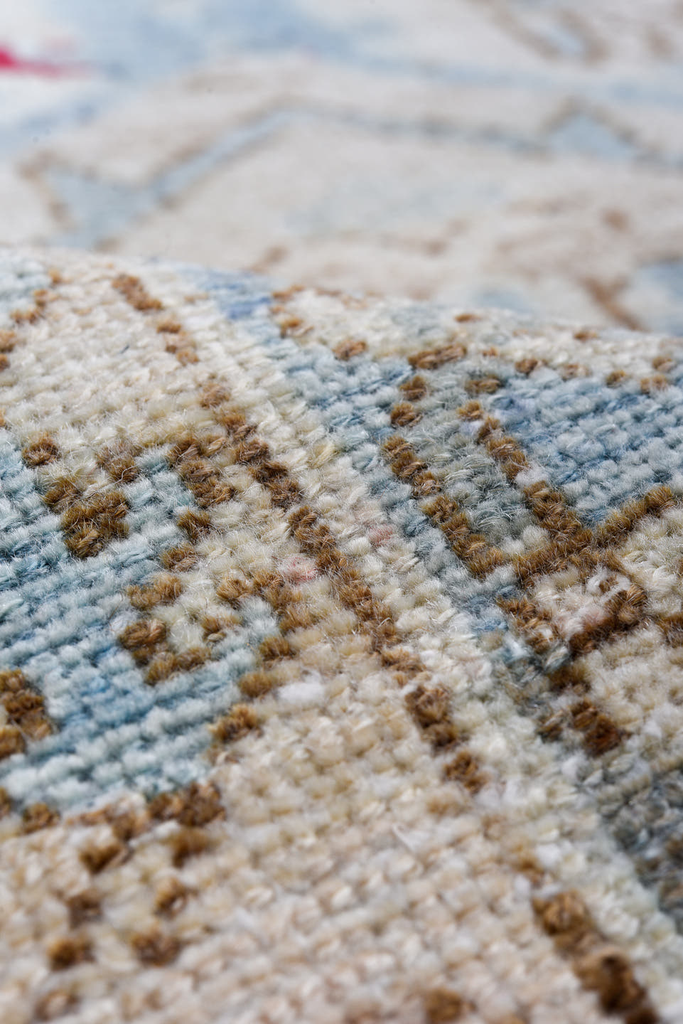 5' x 9' one-of-a-kind handmade antique Baktiary medium size rug. Color palette: ivory, sky blue, camel, brown, rose, crimson