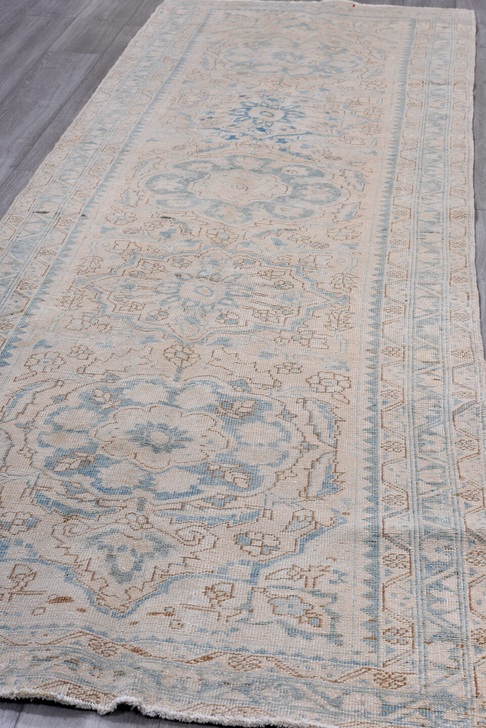 3' x 10' one-of-a-kind handmade antique Heriz runner rug. Color palette: ivory, sky blue, light blue, taupe, beige, gray