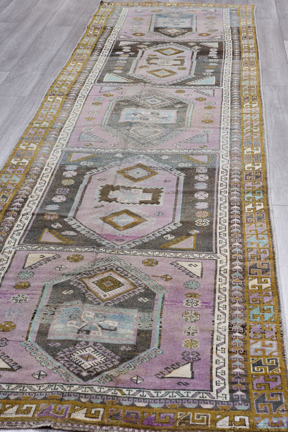 3' x 13' one-of-a-kind handmade antique Oushak runner rug. Color palette: lavender, gold, sky blue, ivory, charcoal, taupe