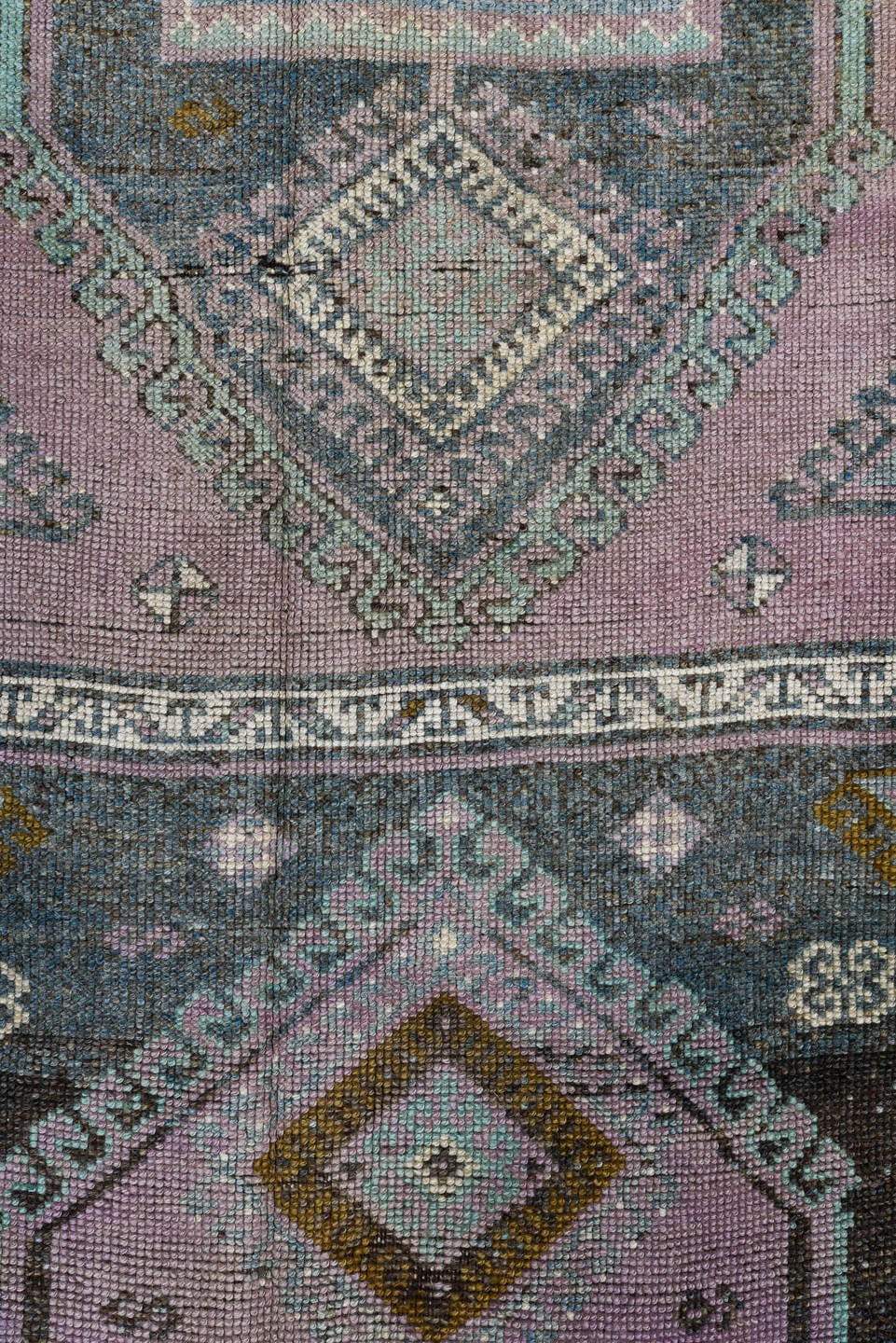 3' x 13' one-of-a-kind handmade antique Oushak runner rug. Color palette: lavender, gold, sky blue, ivory, charcoal, taupe