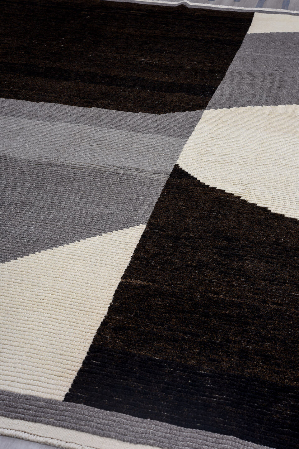 10' x 14' one-of-a-kind handmade vintage Tulu large size rug. Color palette: charcoal, black, ivory, gray