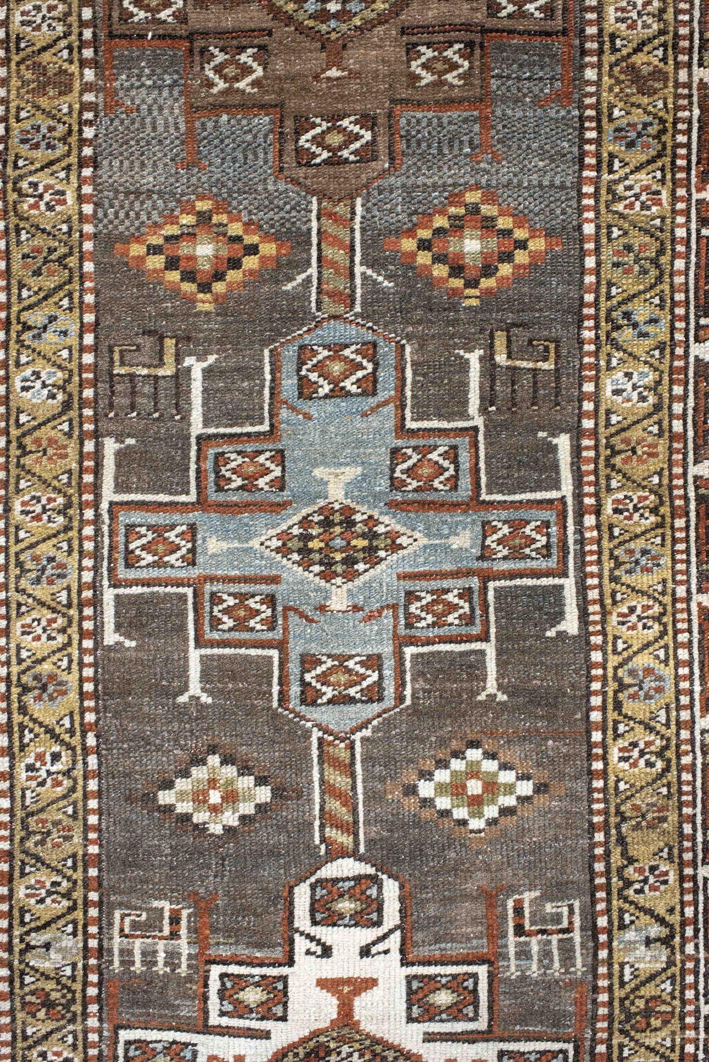 2' x 14' one-of-a-kind handmade antique Heriz runner rug. Color palette: taupe, brown, ivory, rust, camel, charcoal, beige