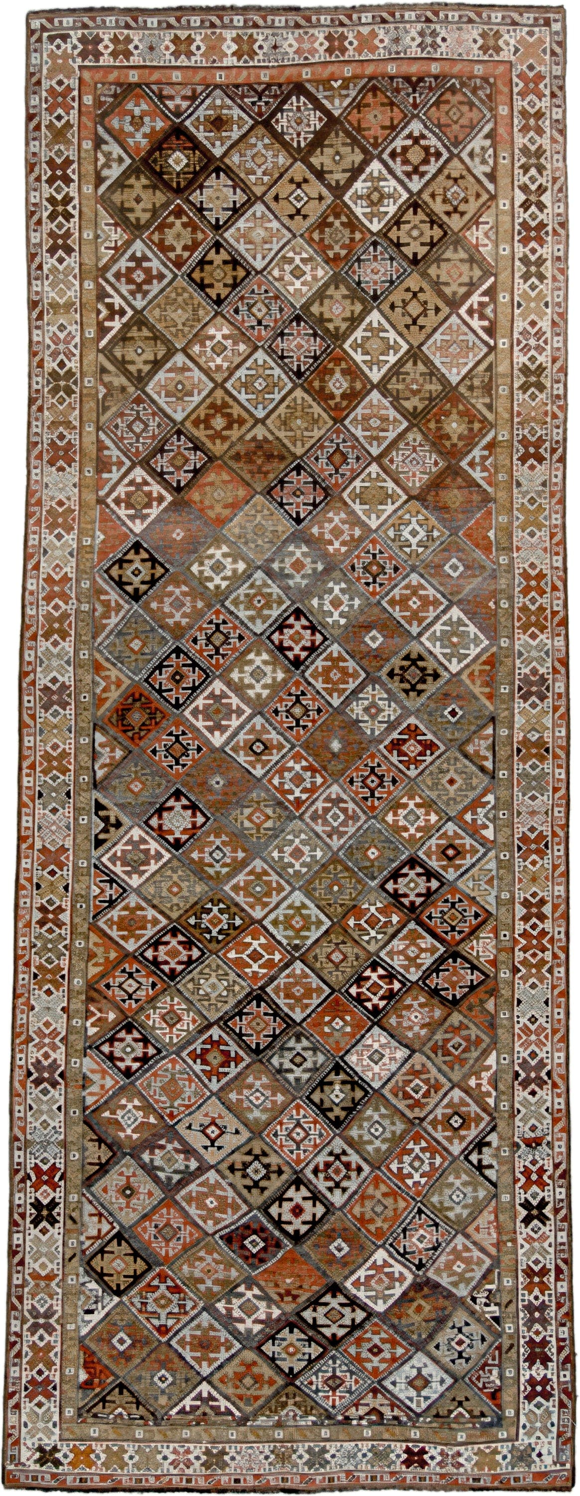 3' x 9' one-of-a-kind handmade antique Kurd runner rug. Color palette: taupe, rust, ivory, brown, charcoal, camel, burgundy