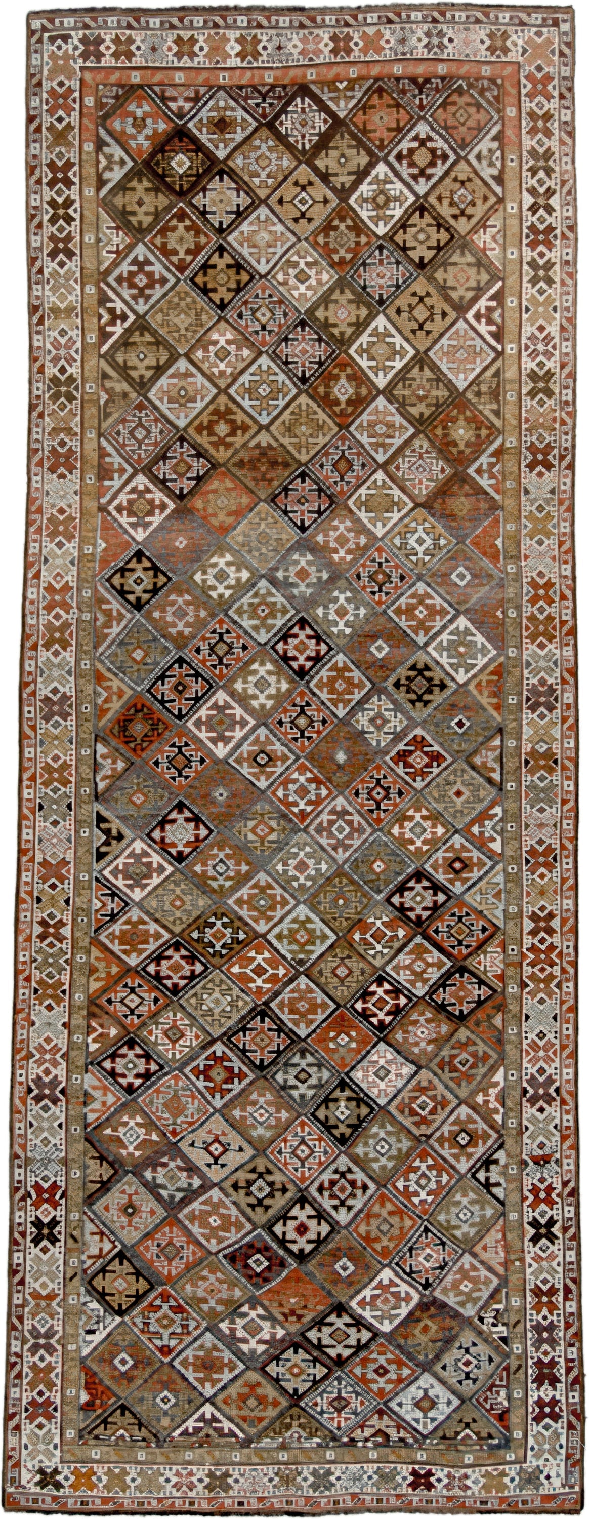 3' x 9' one-of-a-kind handmade antique Kurd runner rug. Color palette: taupe, rust, ivory, brown, charcoal, camel, burgundy