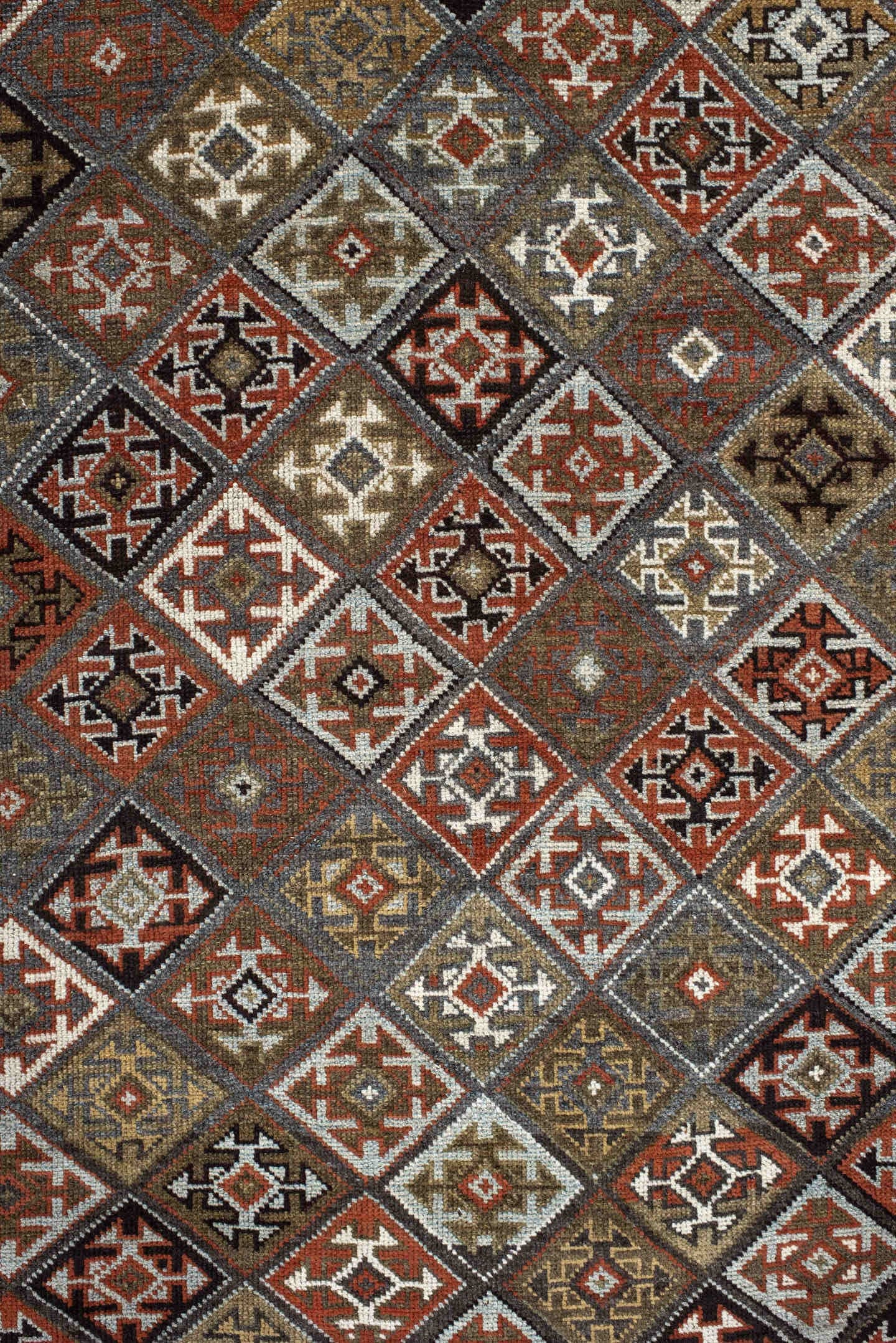 3' x 9' one-of-a-kind handmade antique Kurd runner rug. Color palette: taupe, rust, ivory, brown, charcoal, camel, burgundy