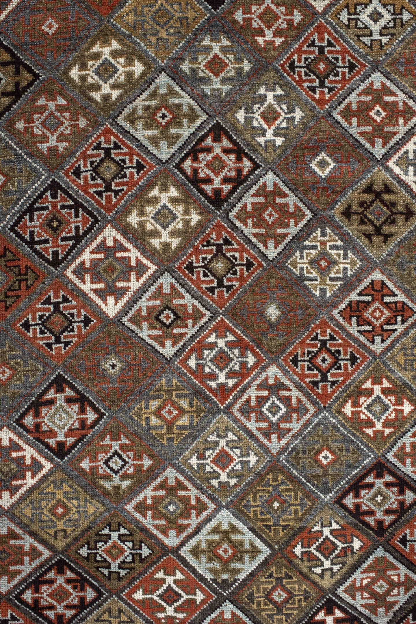 3' x 9' one-of-a-kind handmade antique Kurd runner rug. Color palette: taupe, rust, ivory, brown, charcoal, camel, burgundy