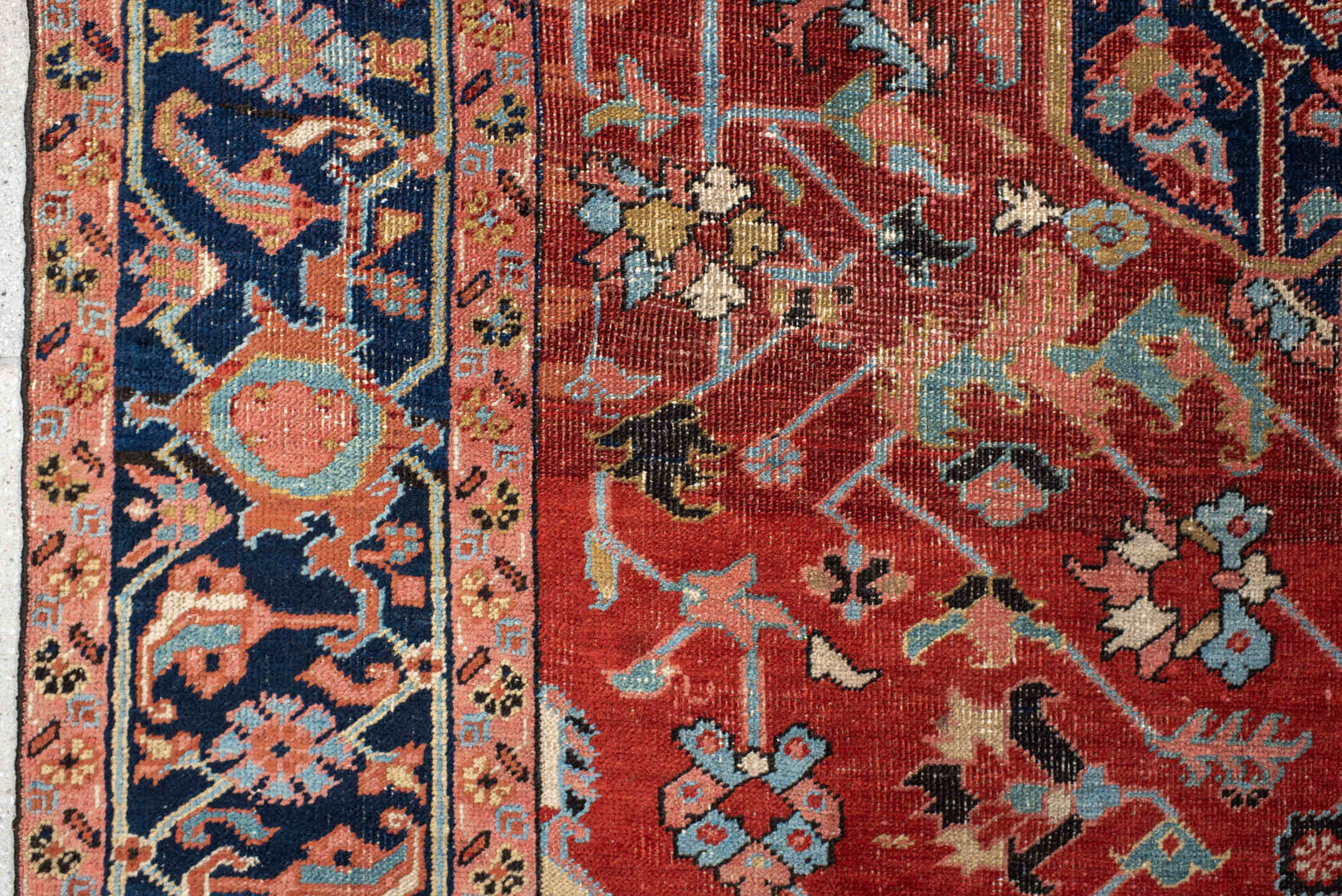 7' x 11' one-of-a-kind handmade antique Heriz large size rug. Color palette: rust, navy, ivory, light_blue, rose, camel