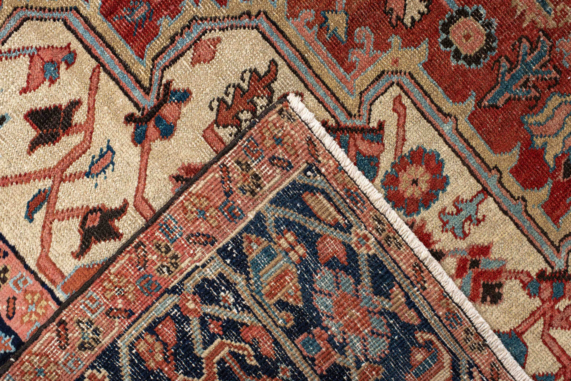 7' x 11' one-of-a-kind handmade antique Heriz large size rug. Color palette: rust, navy, ivory, light_blue, rose, camel