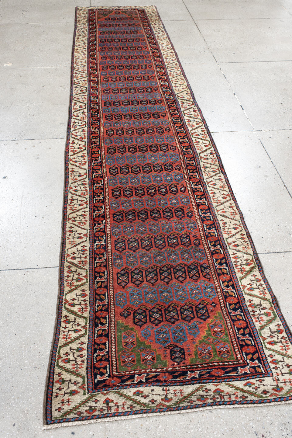 2' x 12' one-of-a-kind handmade vintage NW Persian runner rug. Color palette: black, blue, brown, gray, pink, red, redwood