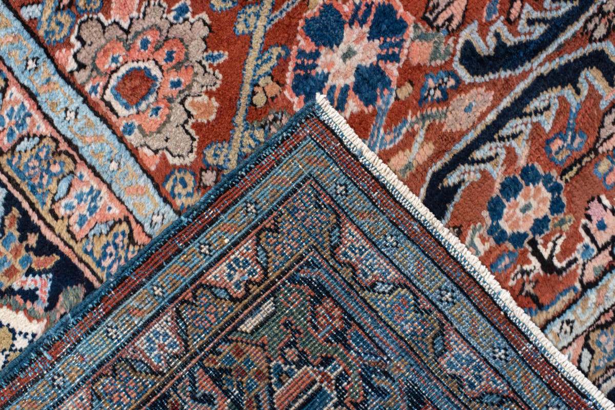 9' x 12' one-of-a-kind handmade antique Heriz large size rug. Color palette: rust, navy, ivory, sky_blue, camel, slate