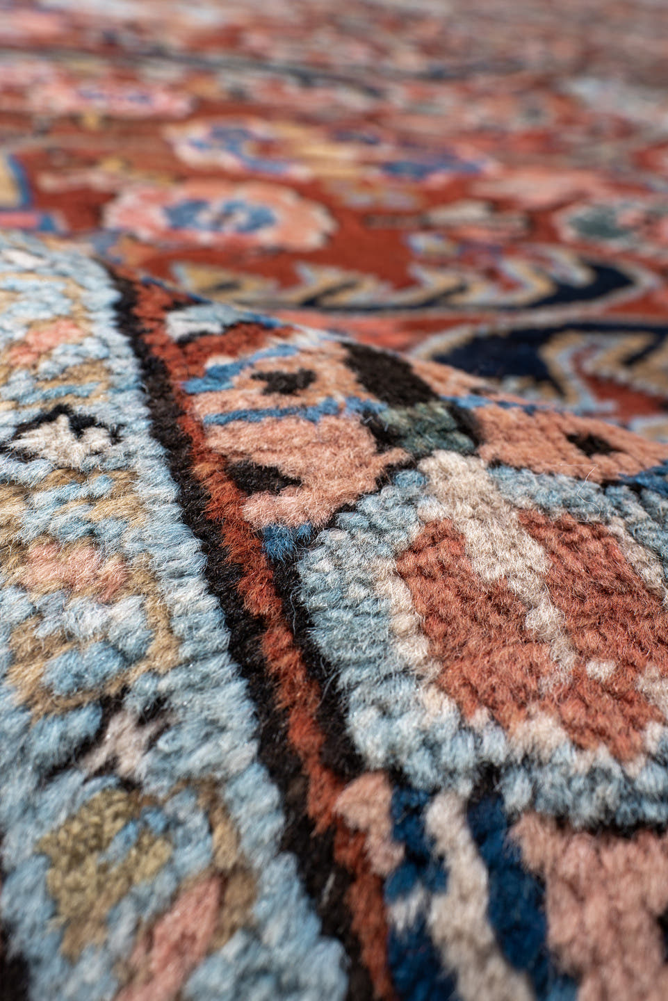 9' x 12' one-of-a-kind handmade antique Heriz large size rug. Color palette: rust, navy, ivory, sky_blue, camel, slate