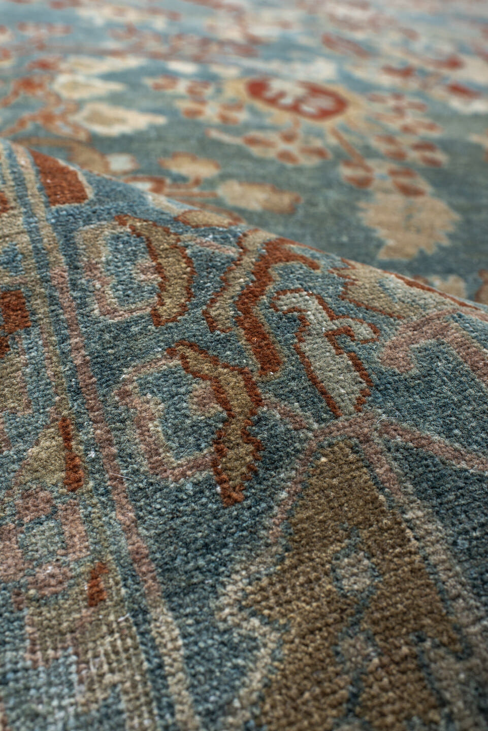 8' x 13' one-of-a-kind handmade antique Sarouk large size rug. Color palette: light blue, rust, ivory, terra cotta, sage