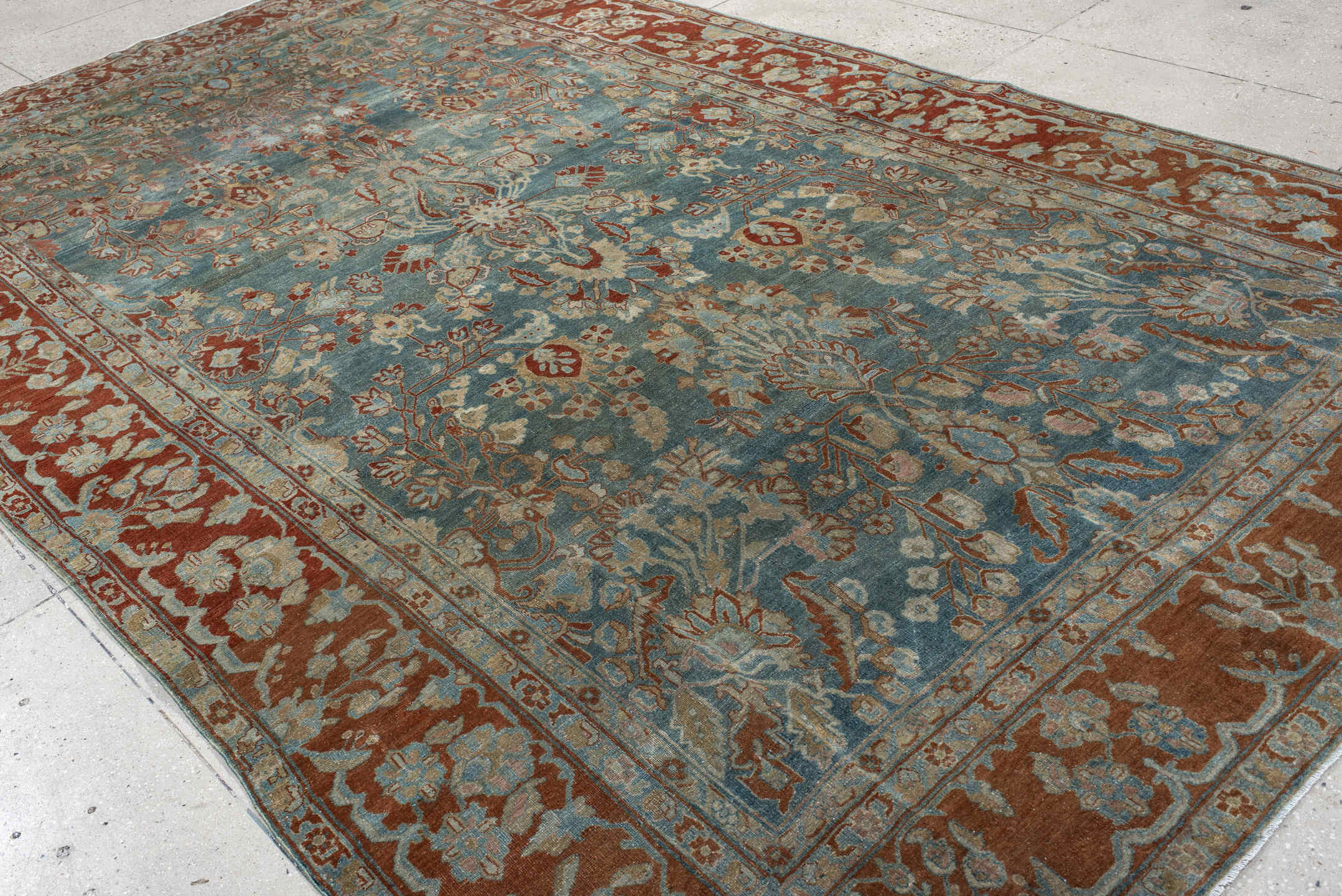 8' x 13' one-of-a-kind handmade antique Sarouk large size rug. Color palette: light blue, rust, ivory, terra cotta, sage
