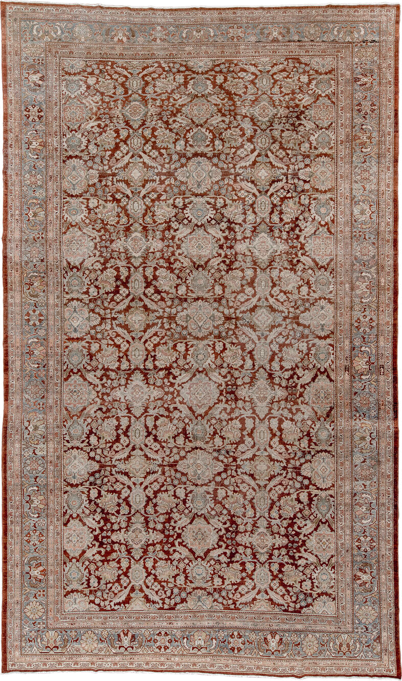 10' x 18' one-of-a-kind handmade antique Sultanabad rug. Color palette: rust, ivory, light blue, taupe, camel, brown
