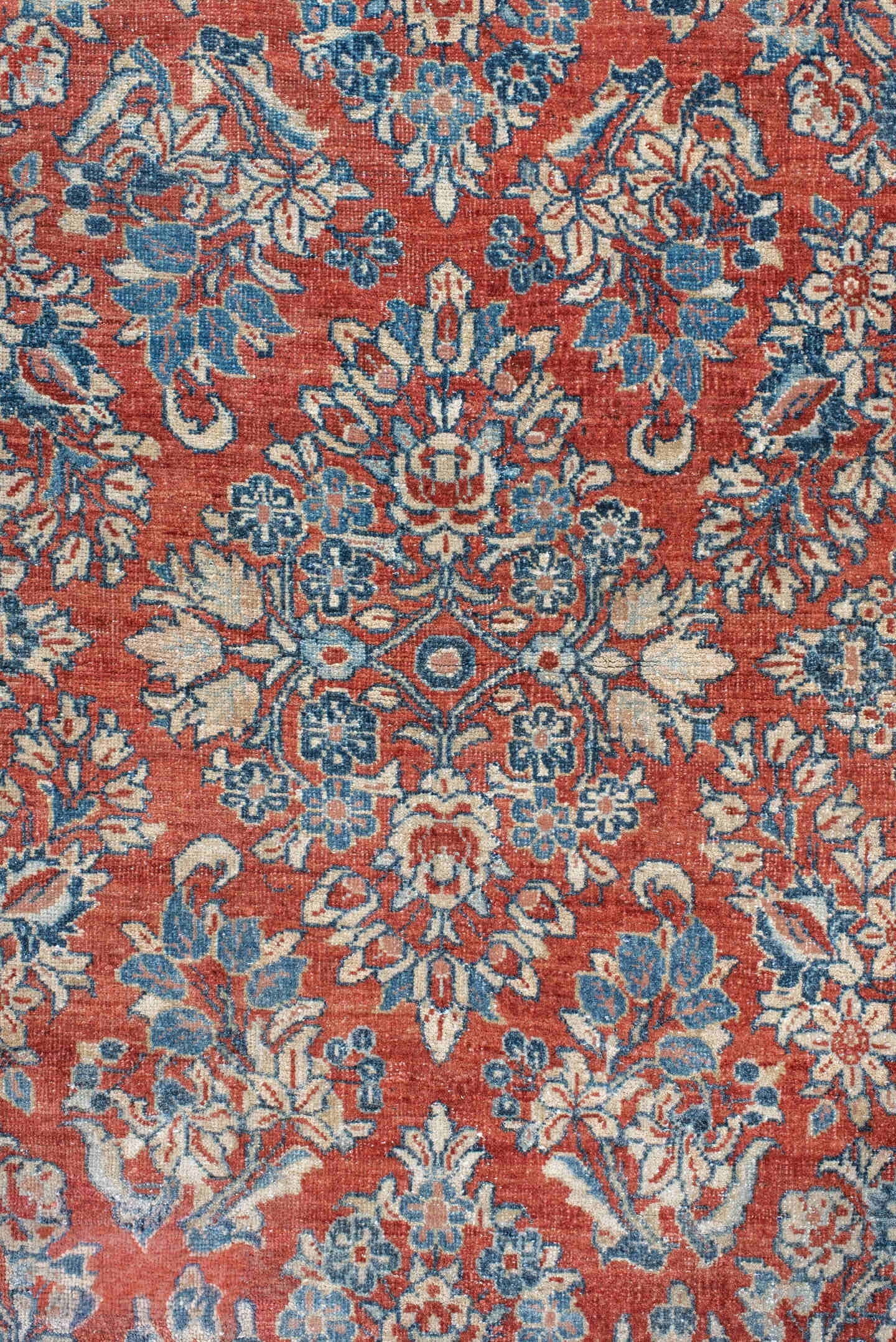 3' x 11' one-of-a-kind handmade antique Sarouk runner rug. Color palette: rust, ivory, blue, navy, cream, terra cotta