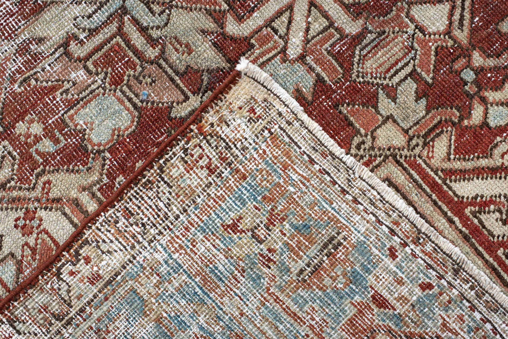 7' x 11' one-of-a-kind handmade antique Heriz large size rug. Color palette: ivory, rust, sky_blue, terra_cotta, taupe