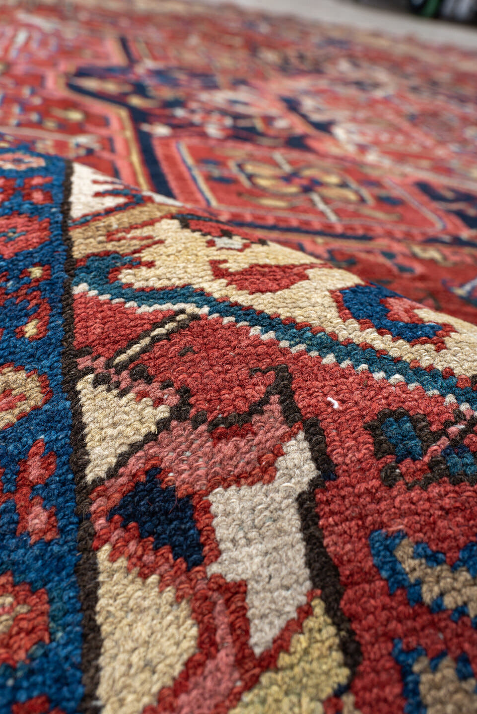 8' x 11' one-of-a-kind handmade antique Heriz large size rug. Color palette: rust, navy, ivory, sky blue, terra cotta, camel