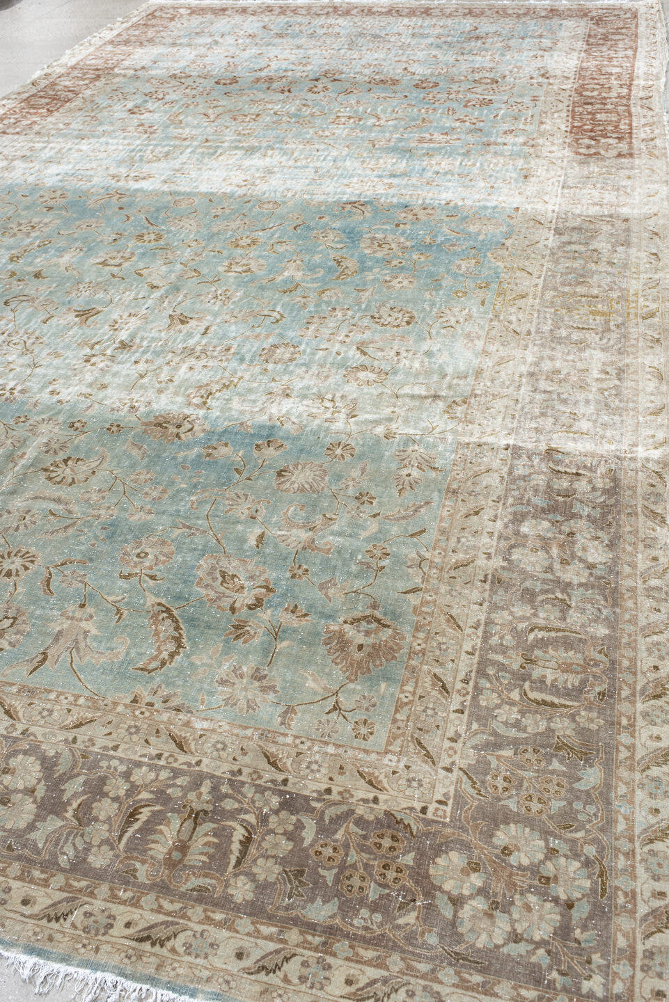 10' x 18' one-of-a-kind handmade antique Kashan rug. Color palette: ivory, pale blue, taupe, rust, beige, camel, light blue