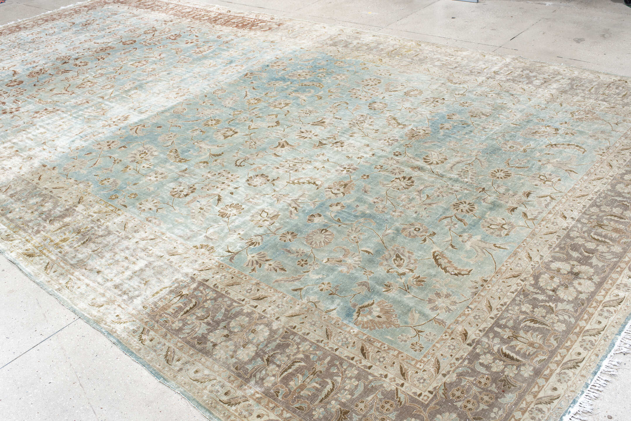 10' x 18' one-of-a-kind handmade antique Kashan rug. Color palette: ivory, pale blue, taupe, rust, beige, camel, light blue