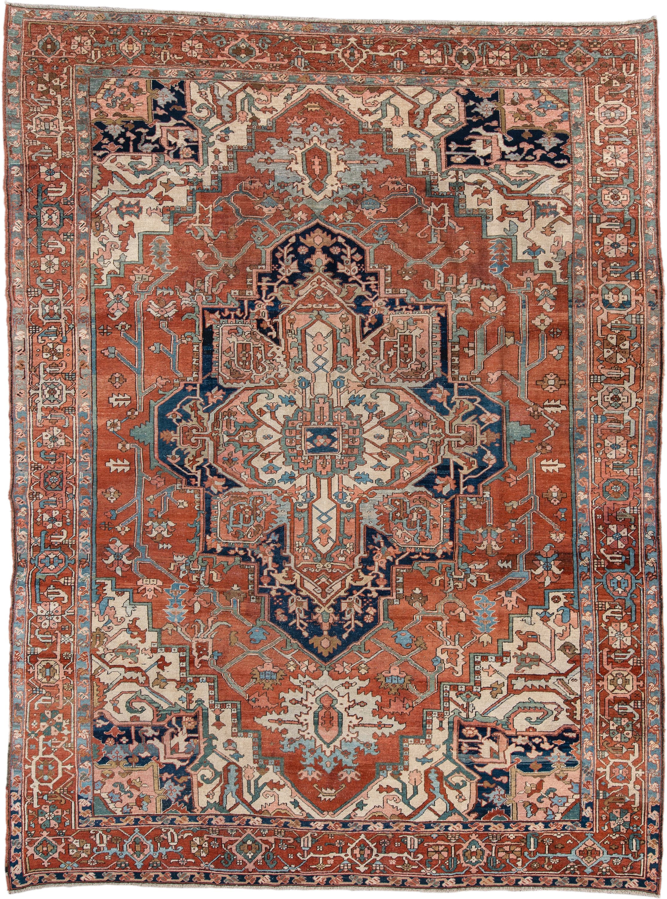 9' x 12' one-of-a-kind handmade vintage Serapi large size rug. Color palette: terra cotta, ivory, sky blue, navy, rust