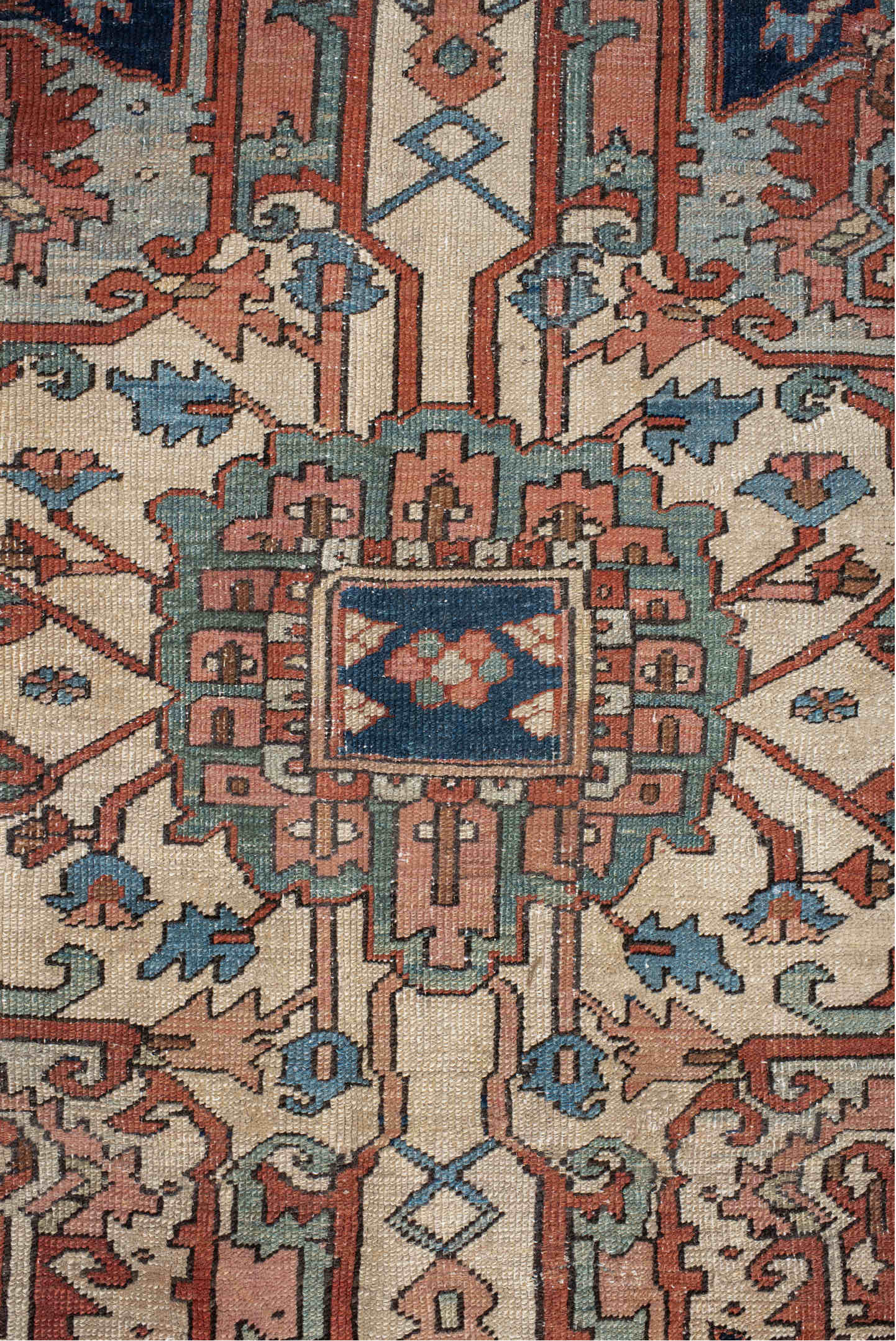 9' x 12' one-of-a-kind handmade vintage Serapi large size rug. Color palette: terra cotta, ivory, sky blue, navy, rust