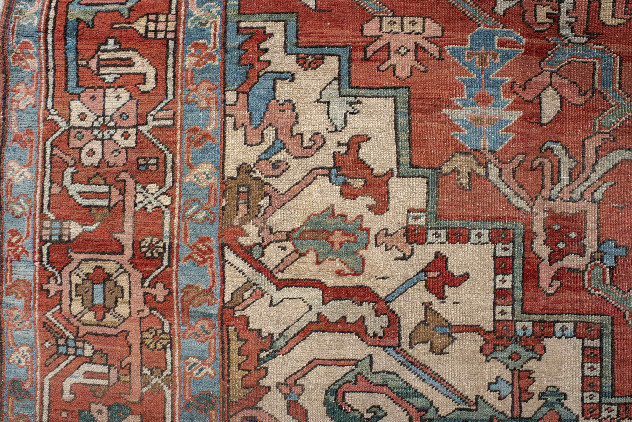 9' x 12' one-of-a-kind handmade vintage Serapi large size rug. Color palette: terra cotta, ivory, sky blue, navy, rust